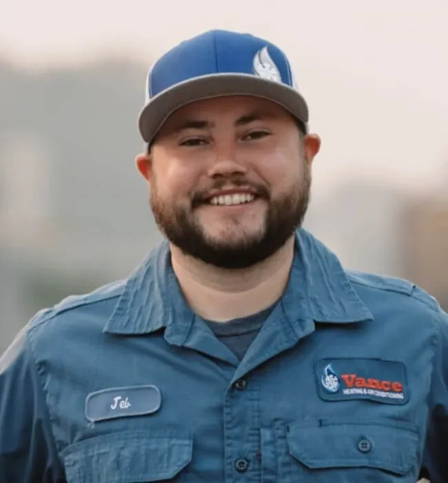 Photo Of Vance Technician With A Brand Hat