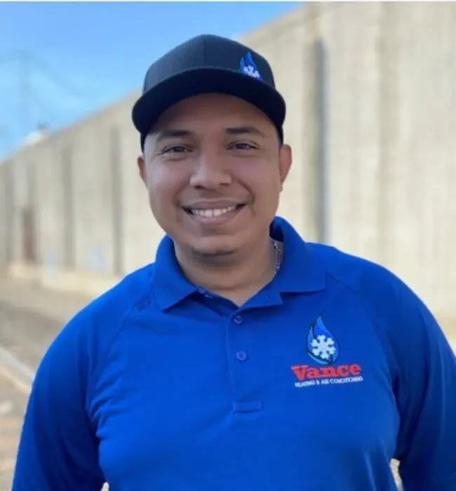 Photo Of Vance Technician Smiling With A Hat On