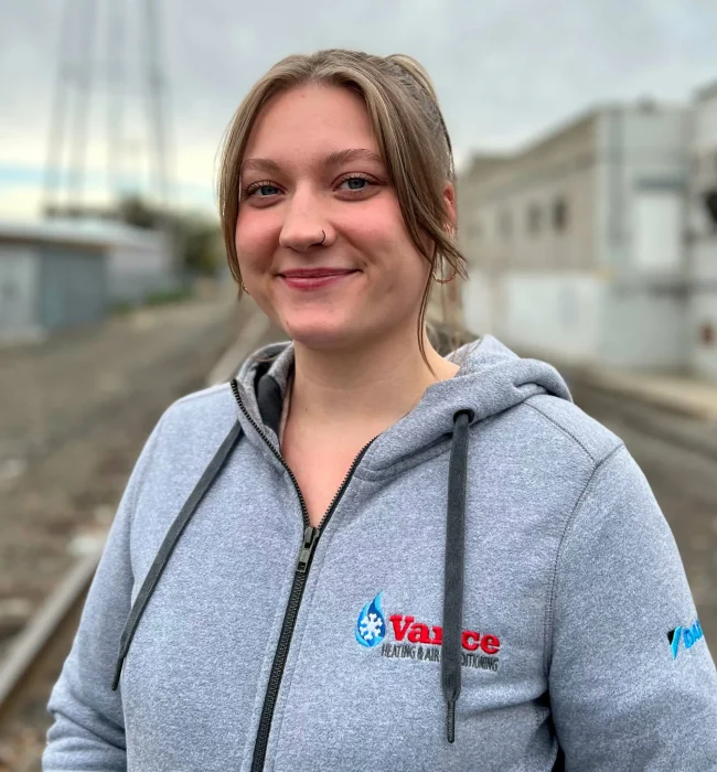 Photo of Vance employee wearing a brand sweatshirt